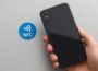 Smartphone wird über einem NFC-Tag gehalten zur Steuerung von Geräten